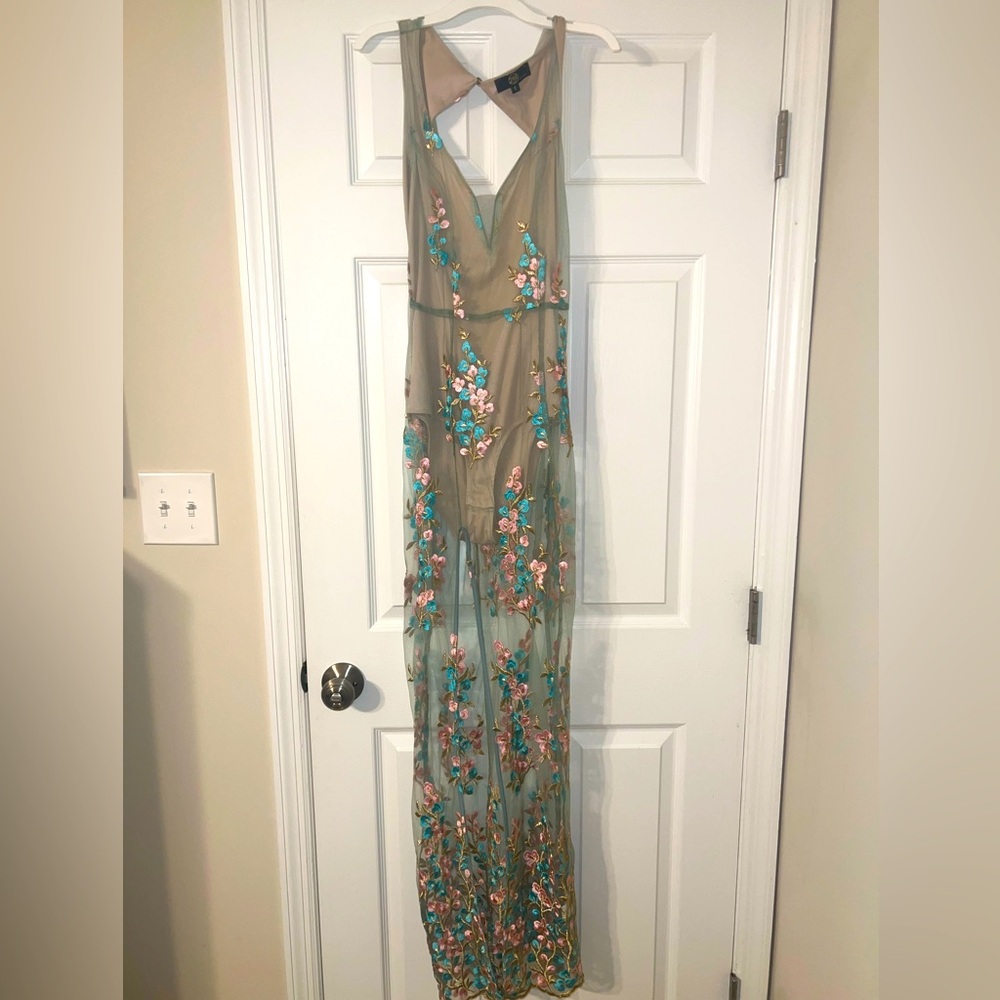 NEW Gorgeous sheer floral dress with nude colored bodysuit attached inside.